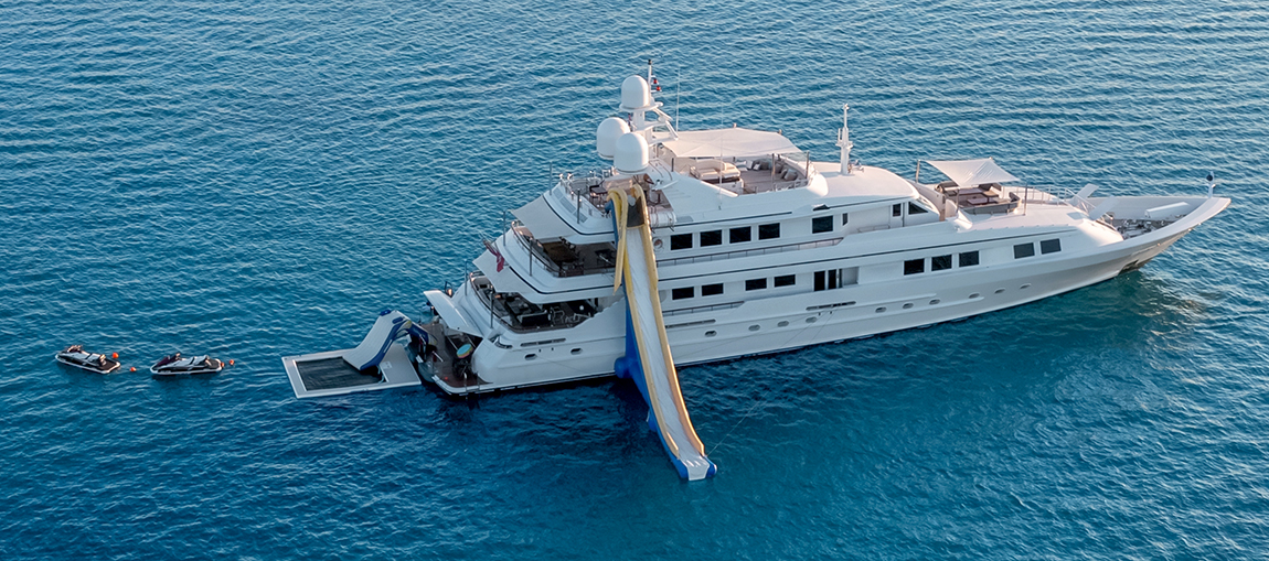 inflatable water slide on a luxury yacht